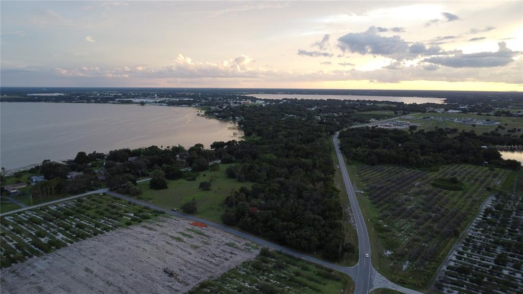 742 North Lake Reedy Boulevard Frostproof, FL 33843 - Photo 5 of 19 a view of a lake from a yard