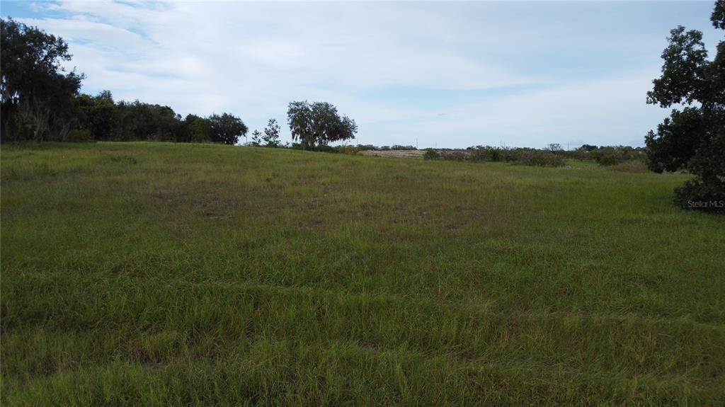742 North Lake Reedy Boulevard Frostproof, FL 33843 - Photo 9 of 19 a view of a field with an ocean