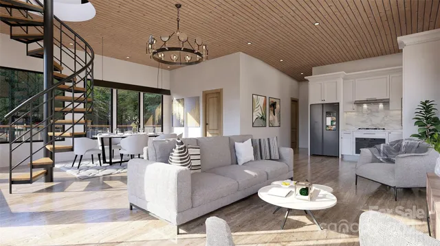 a living room with furniture a dining table and a chandelier