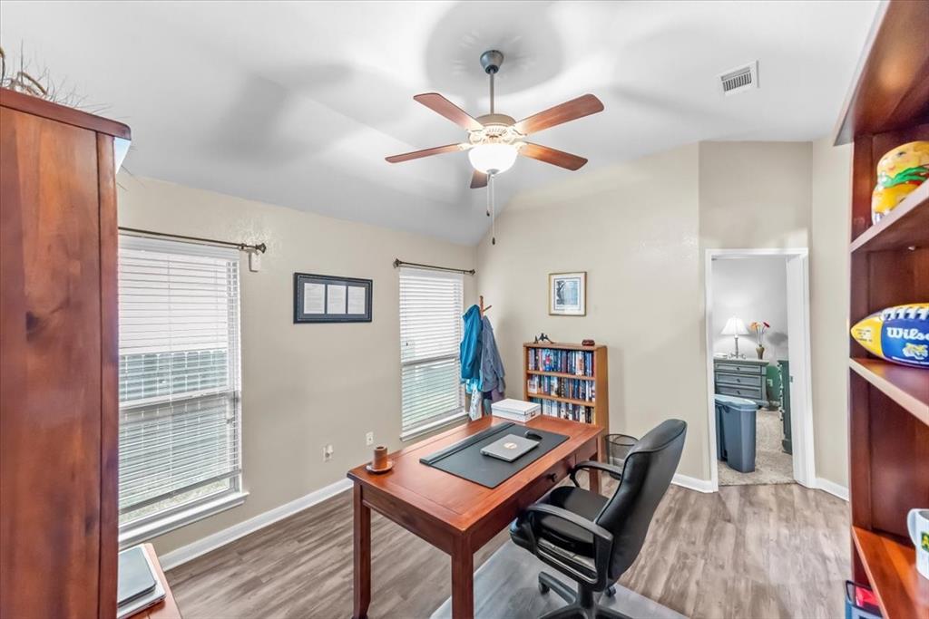 10861 Burnham Drive Waco, TX 76708 - Photo 12 of 27 a living room with furniture and a window