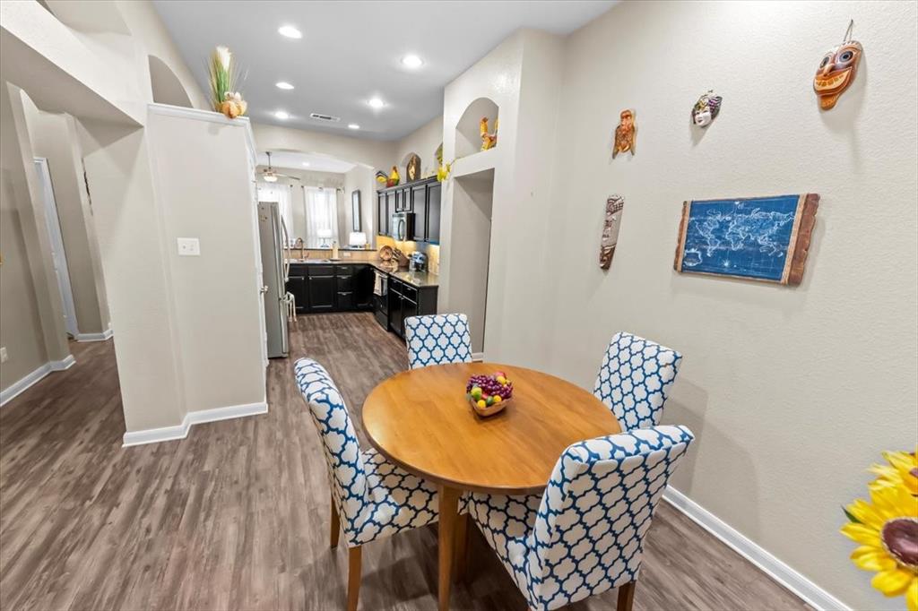 10861 Burnham Drive Waco, TX 76708 - Photo 6 of 27 a living room with furniture and a table