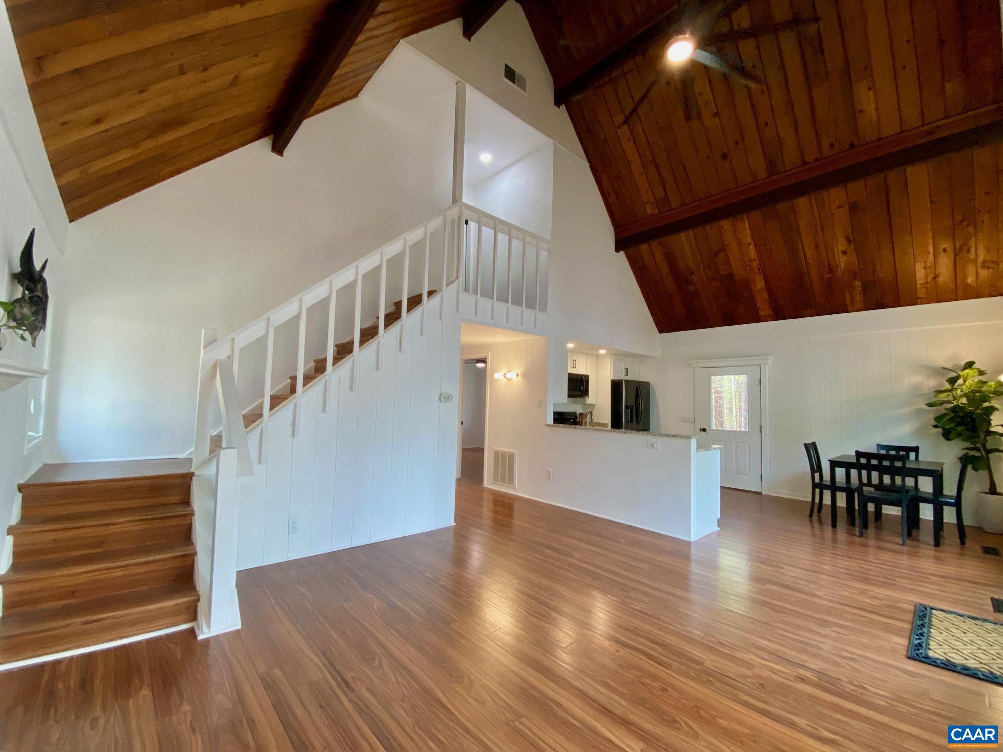 24 Tanglewood Road Palmyra, VA 22963 - Photo 5 of 23 a view of entryway and hall with wooden floor