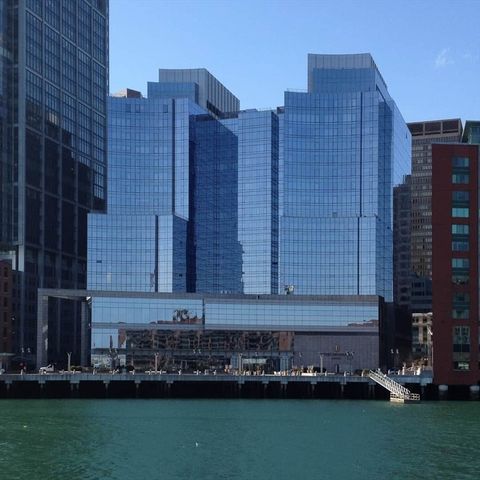a view of a building with a potted plant