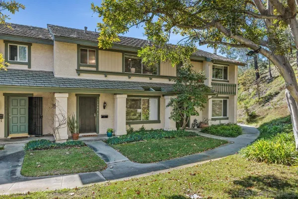 front view of a house with a yard