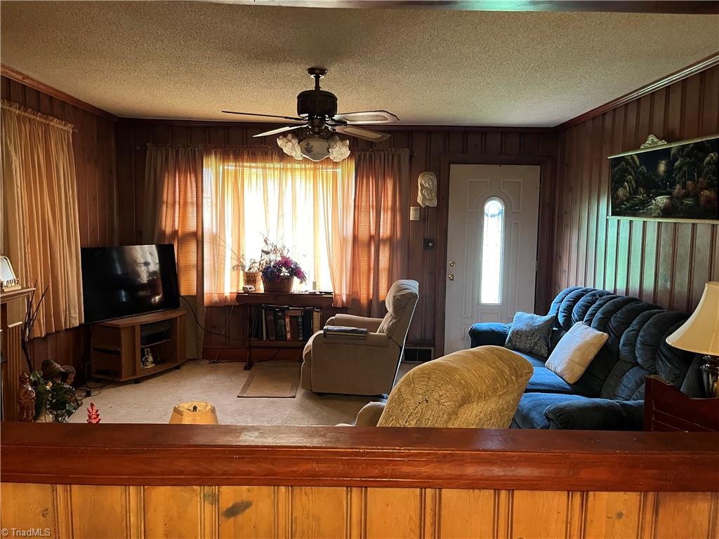 516 Mt Olivet Church Road Lexington, NC 27295 - Photo 18 of 49 LR DIVIDED BY HALF WALL FROM KITCHEN