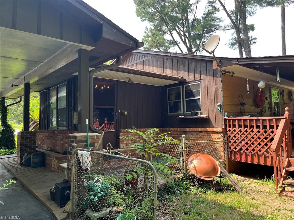 516 Mt Olivet Church Road Lexington, NC 27295 - Photo 7 of 49 CARPORT PROXIMITY TO DEN ENTRY