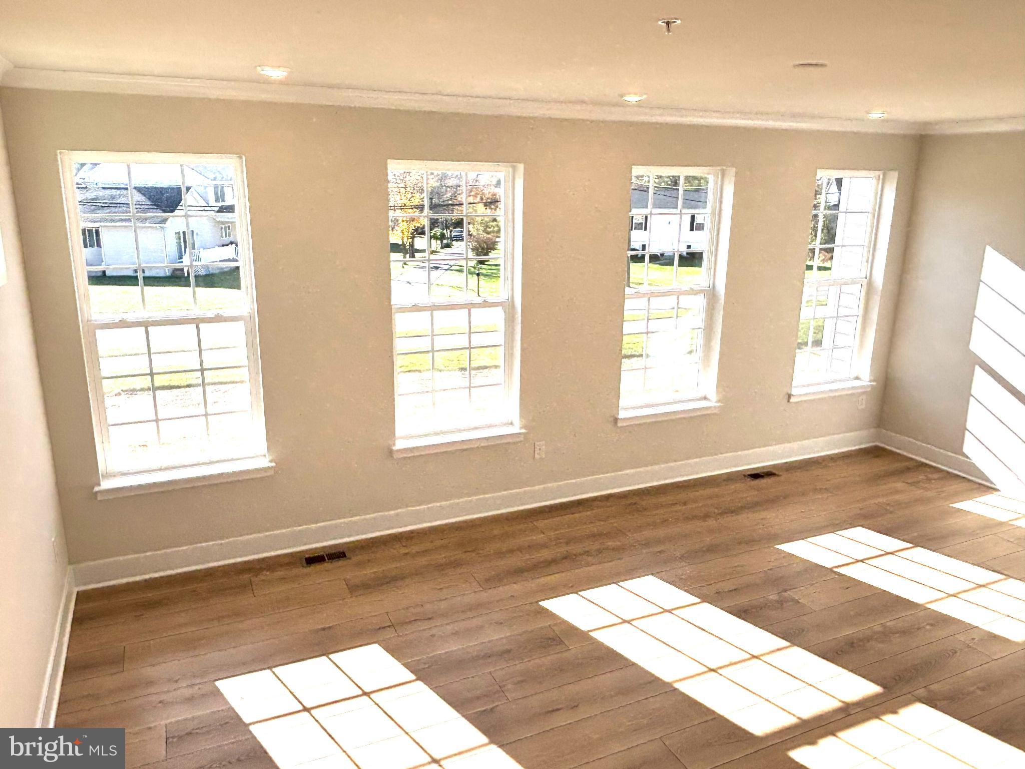 7700 Johnnycake Road Windsor Mill, MD 21244 - Photo 5 of 17 a view of an empty room with a window