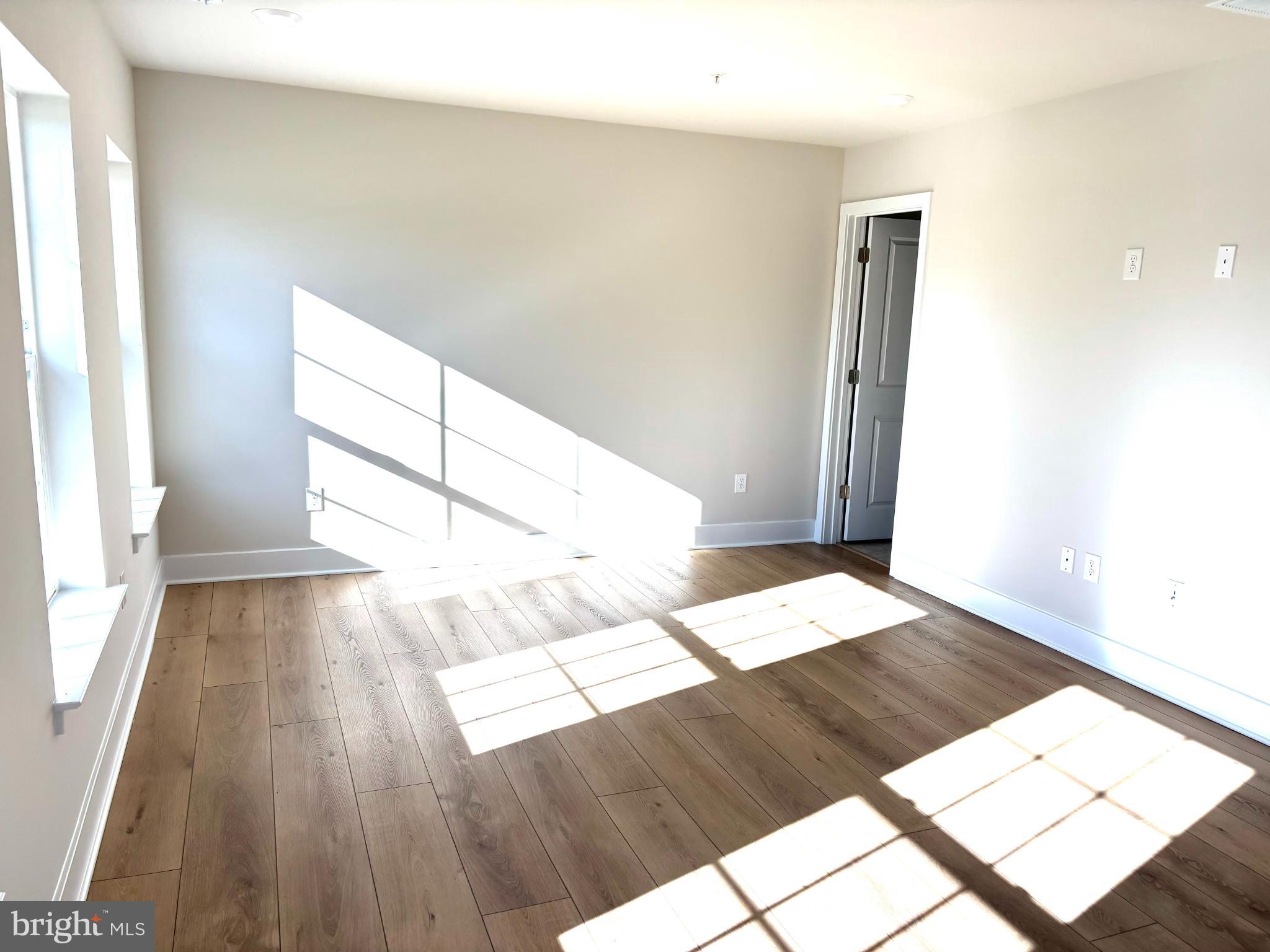 7700 Johnnycake Road Windsor Mill, MD 21244 - Photo 6 of 17 a view of wooden floor