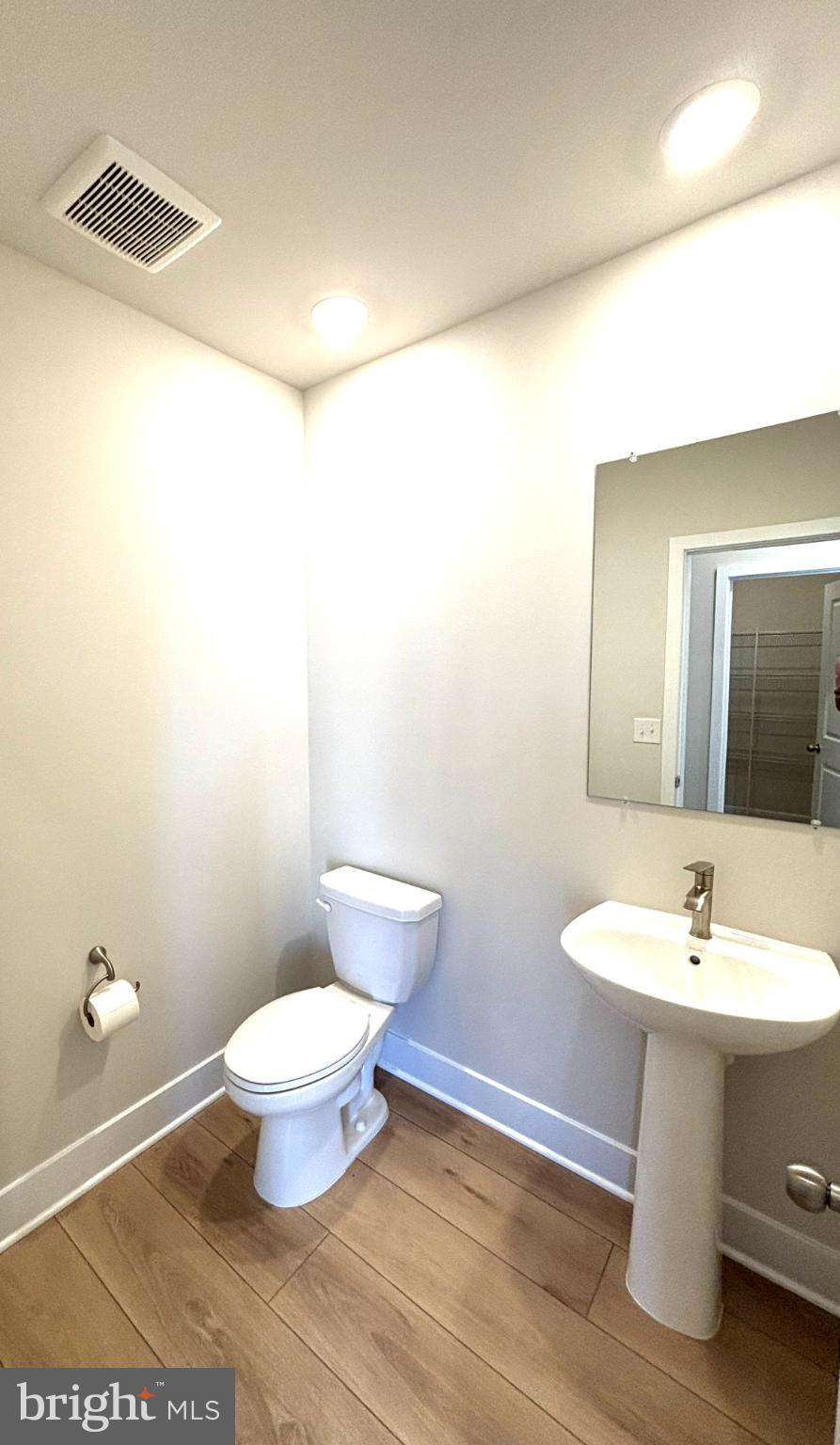 7700 Johnnycake Road Windsor Mill, MD 21244 - Photo 10 of 17 a bathroom with a sink and a toilet
