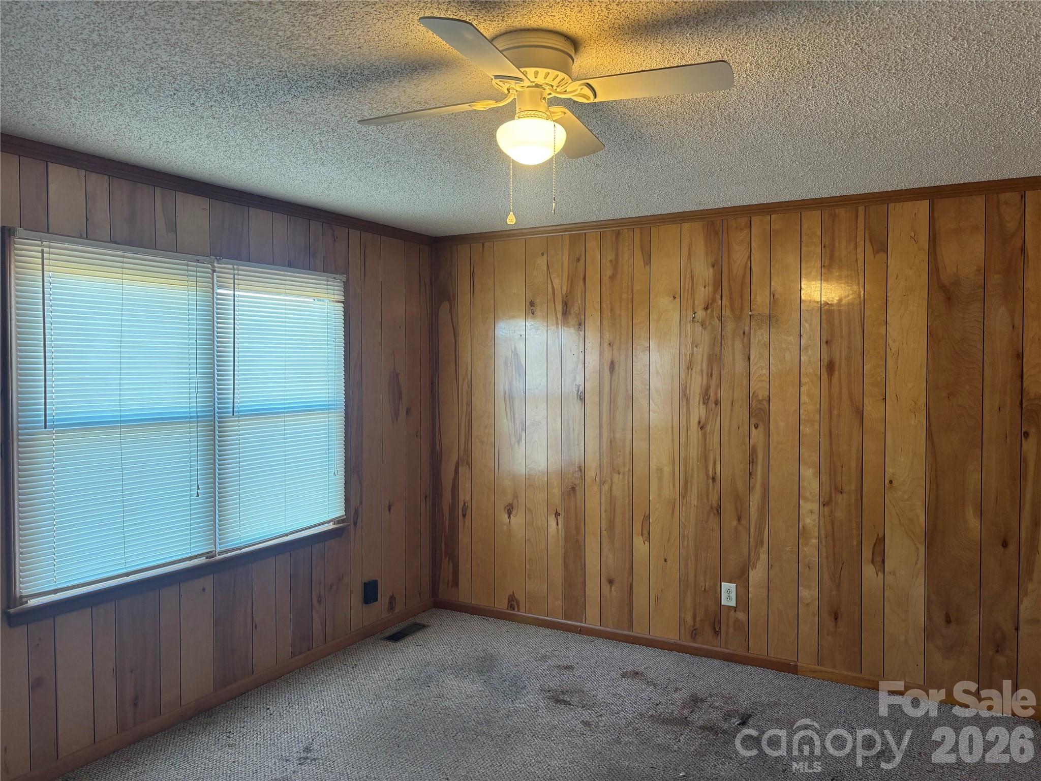 4000 Ansonville Road Marshville, NC 28103 - Photo 11 of 22 wooden floor in an empty room with a window
