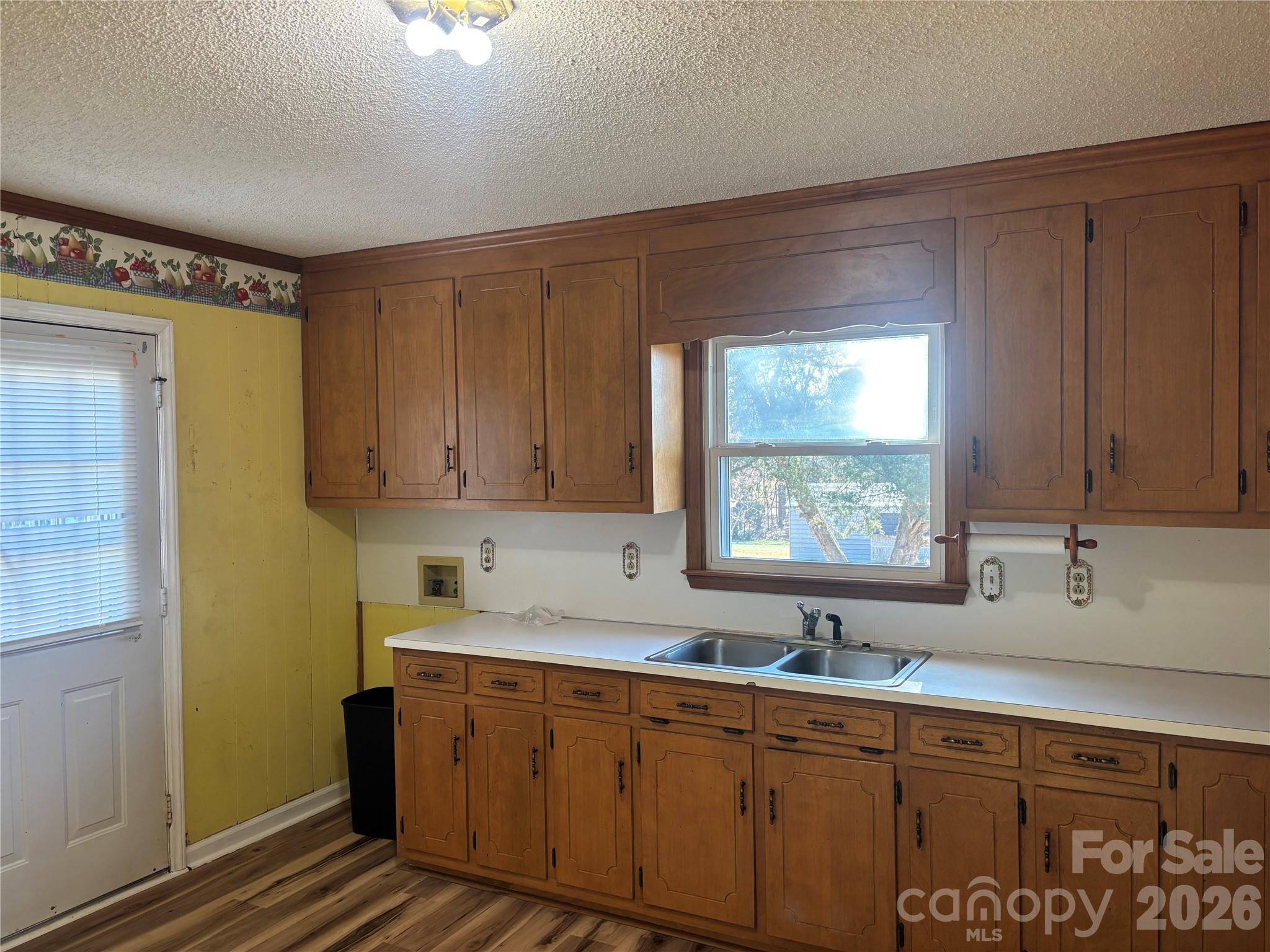 4000 Ansonville Road Marshville, NC 28103 - Photo 16 of 22 a kitchen with sink cabinets and window