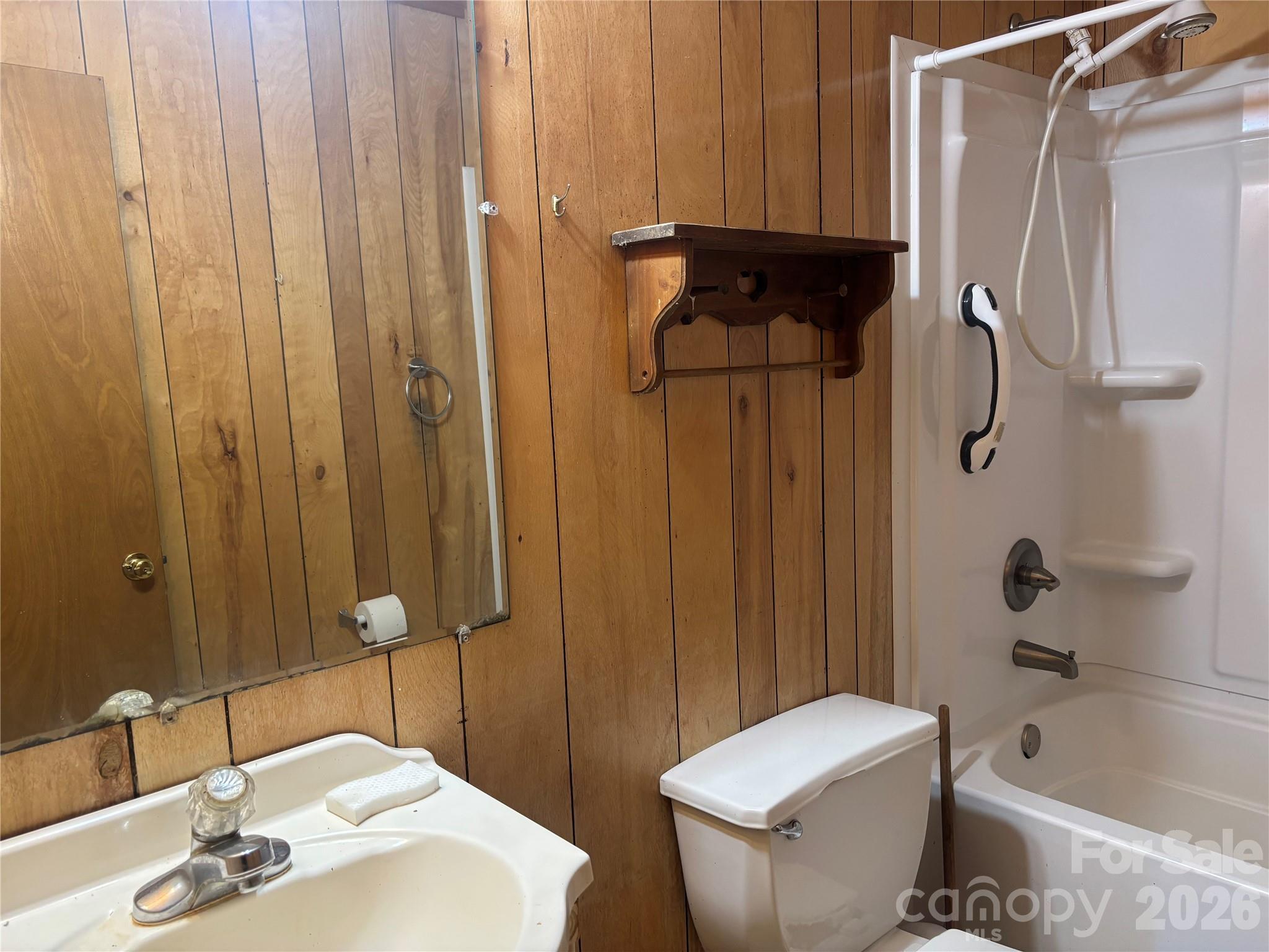 4000 Ansonville Road Marshville, NC 28103 - Photo 21 of 22 a bathroom with a sink a toilet and shower