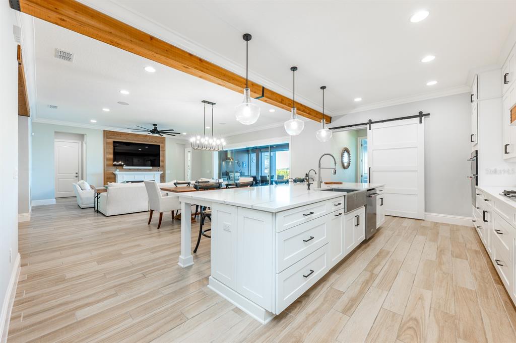 9014 Morgana Court Winter Garden, FL 34787 - Photo 15 of 55 a large white kitchen with a large window
