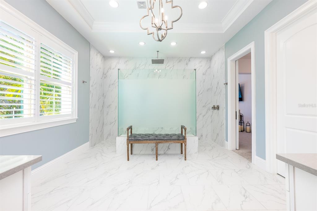 9014 Morgana Court Winter Garden, FL 34787 - Photo 23 of 55 a view of a bathroom with a shower and a sink