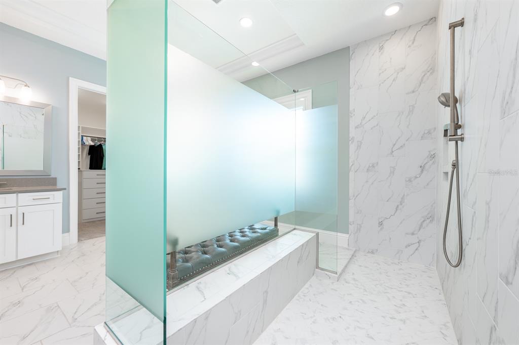 9014 Morgana Court Winter Garden, FL 34787 - Photo 24 of 55 a bathroom with a bathtub and a shower