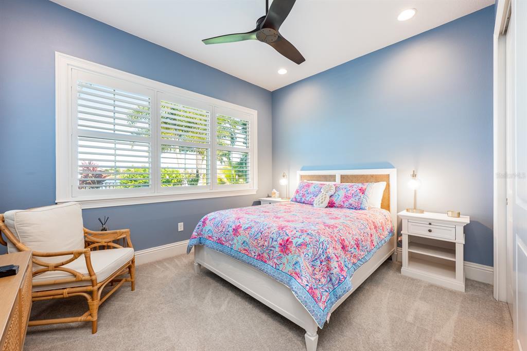 9014 Morgana Court Winter Garden, FL 34787 - Photo 27 of 55 a bedroom with a bed and a window