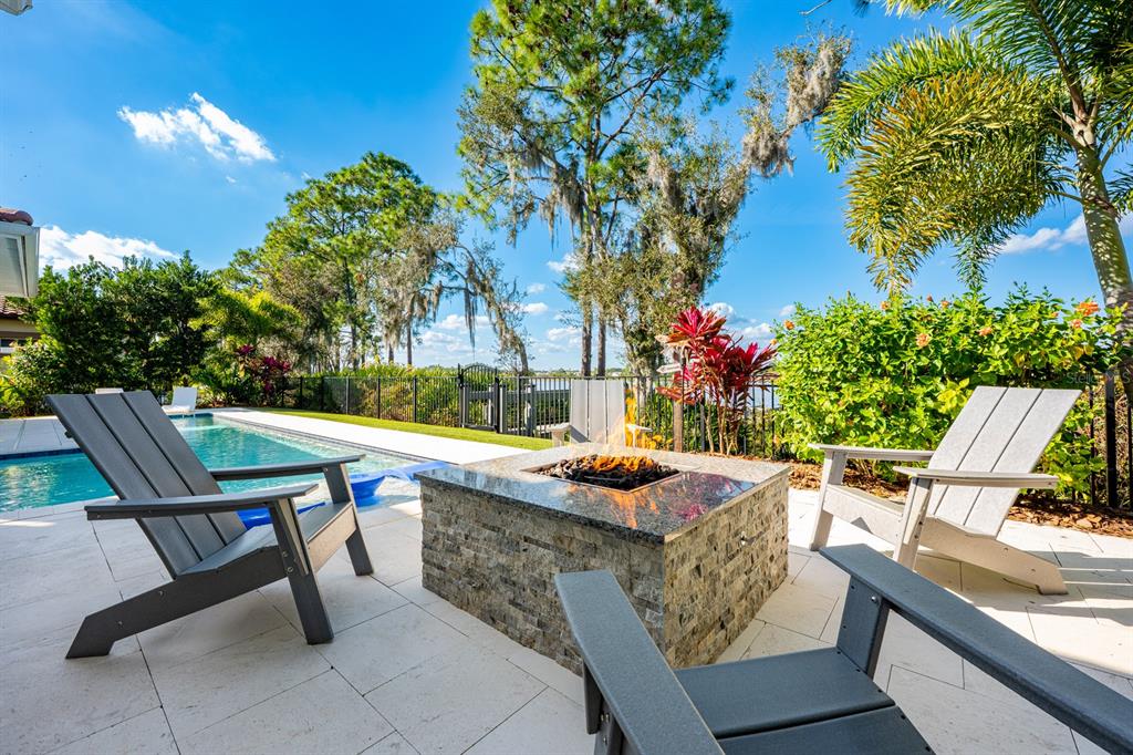 9014 Morgana Court Winter Garden, FL 34787 - Photo 44 of 55 a view of a chairs and table in the patio