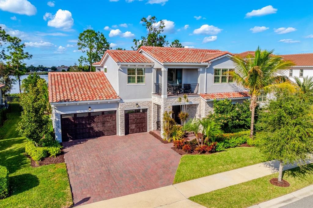 9014 Morgana Court Winter Garden, FL 34787 - Photo 55 of 55 a front view of a house with a garden