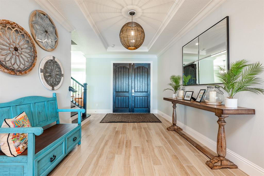 9014 Morgana Court Winter Garden, FL 34787 - Photo 6 of 55 a view of a hallway to a livingroom with furniture