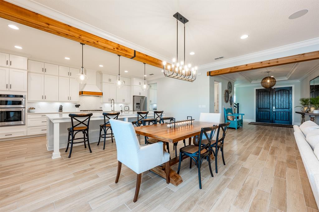9014 Morgana Court Winter Garden, FL 34787 - Photo 7 of 55 a large kitchen with a table and chairs