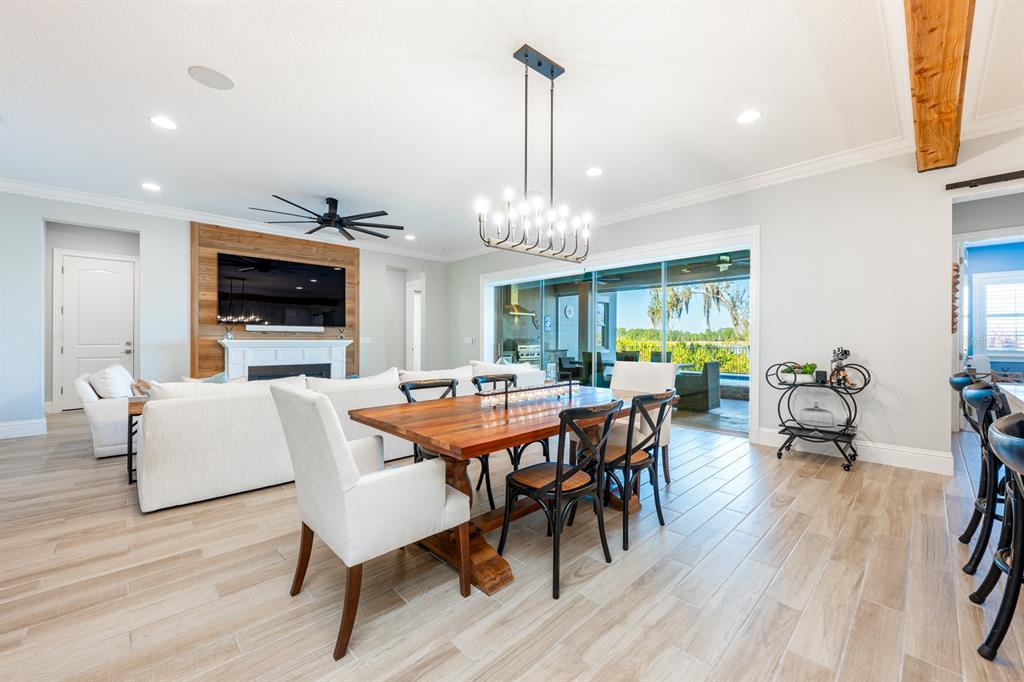 9014 Morgana Court Winter Garden, FL 34787 - Photo 8 of 55 a view of a dining room with furniture window and wooden floor