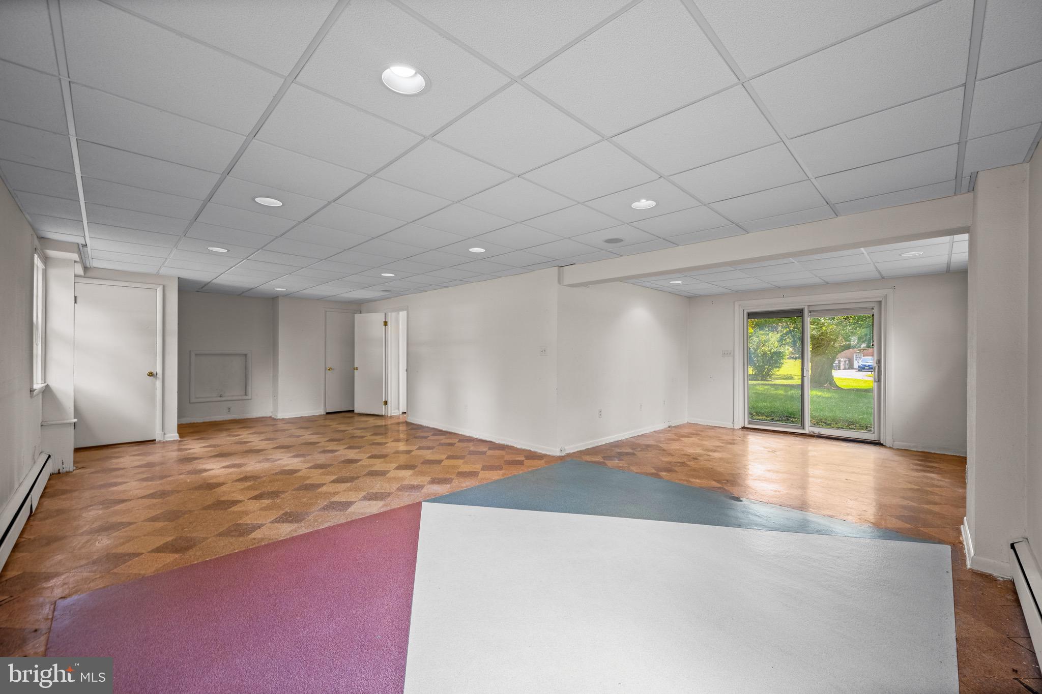 5002 Durham Road East Columbia, MD 21044 - Photo 50 of 62 a view of an empty room with window and wooden floor