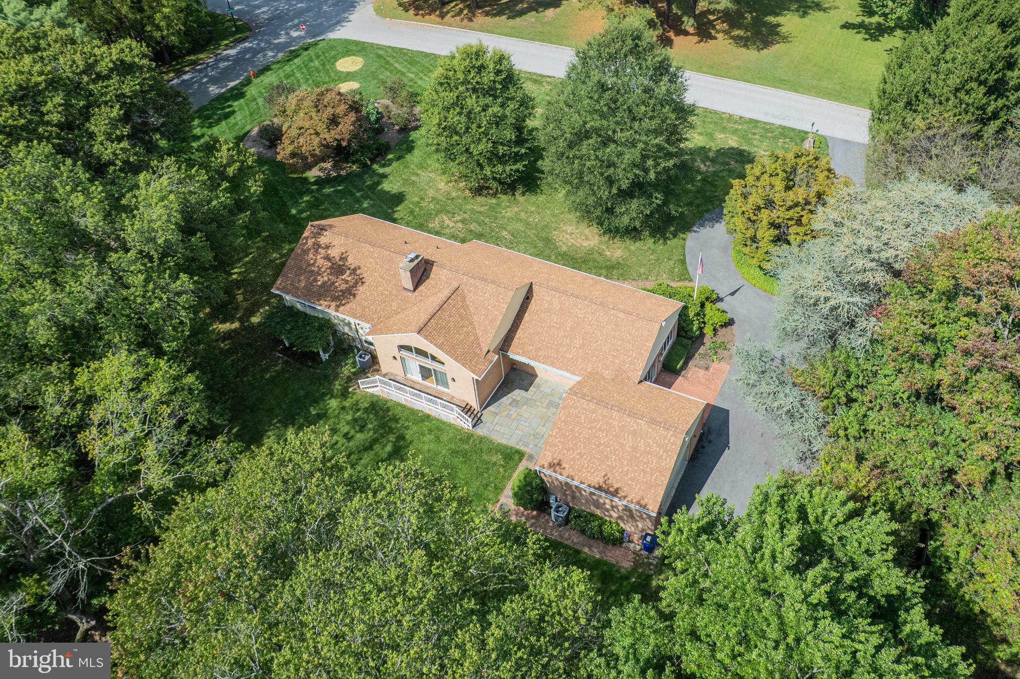 5002 Durham Road East Columbia, MD 21044 - Photo 6 of 62 an aerial view of a house with yard and outdoor seating