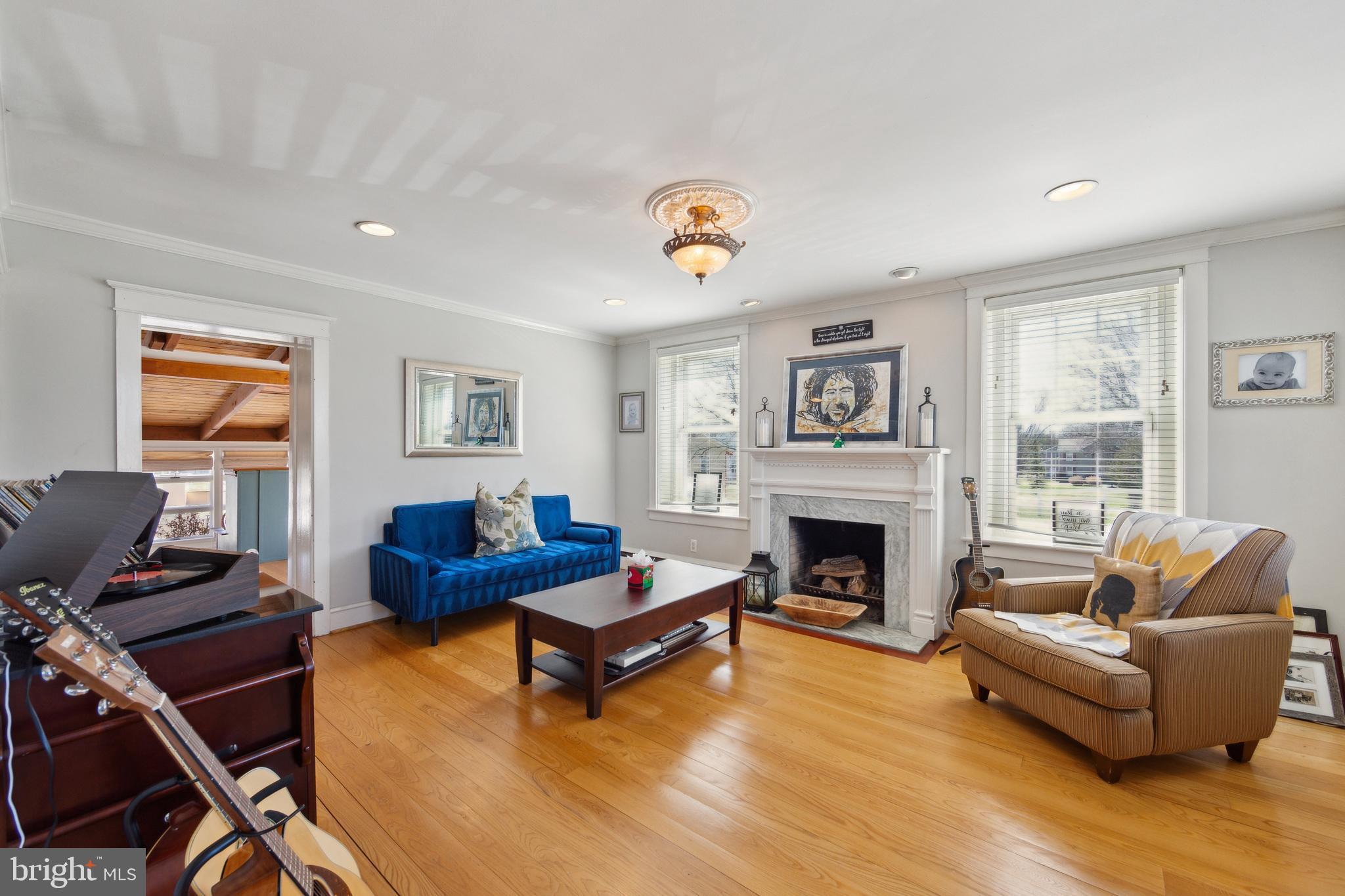 86 Sunset Road Royersford, PA 19468 - Photo 31 of 75 a living room with furniture and a fireplace