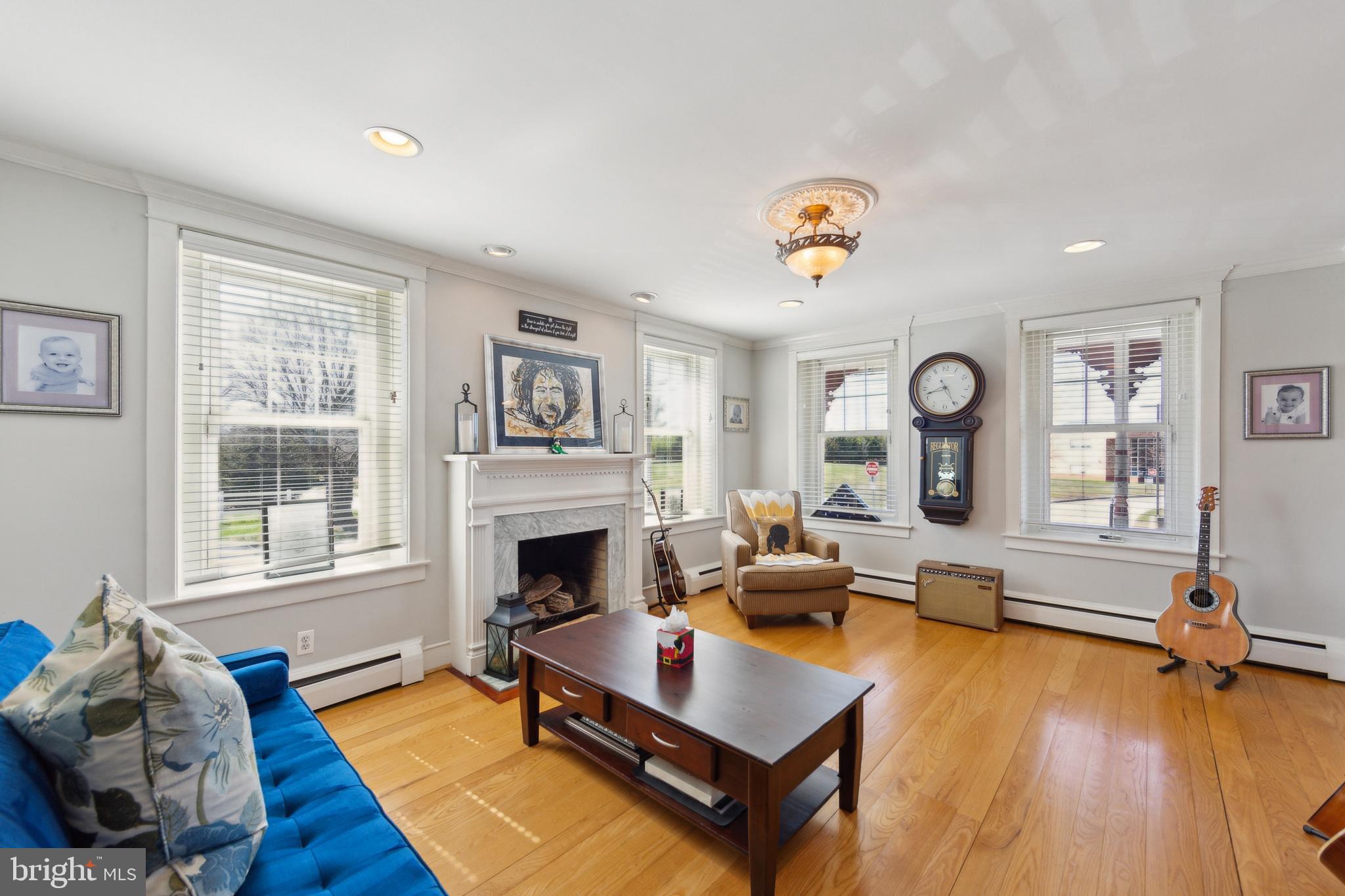 86 Sunset Road Royersford, PA 19468 - Photo 33 of 75 a living room with furniture and a fireplace