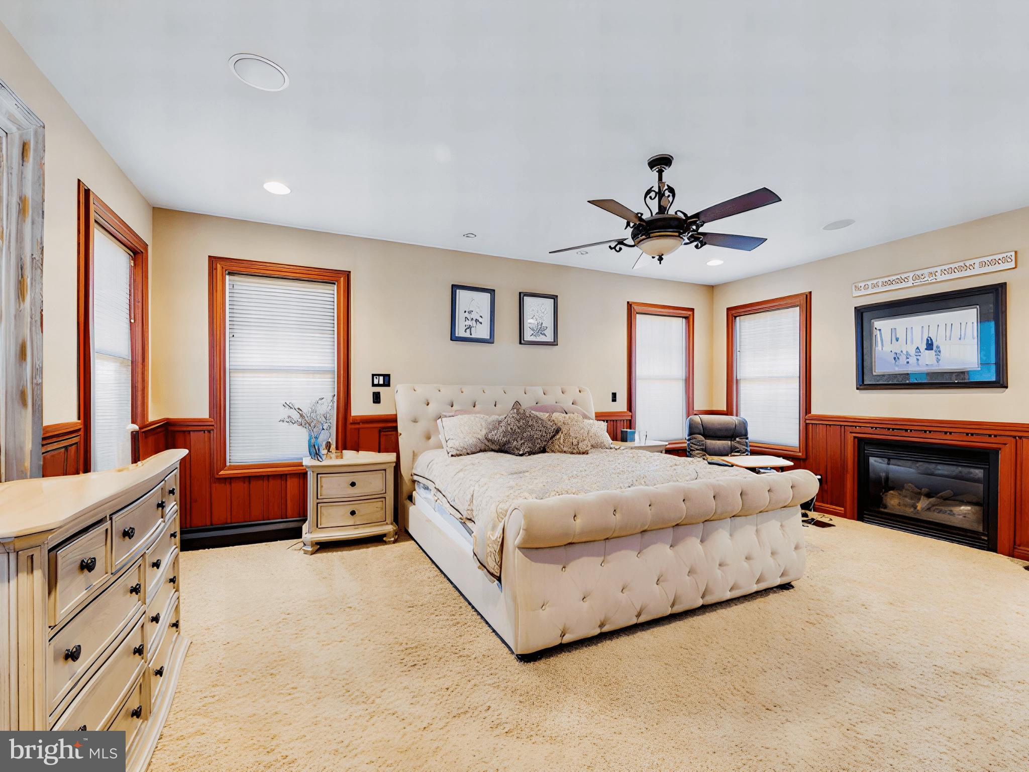 86 Sunset Road Royersford, PA 19468 - Photo 36 of 75 a spacious bedroom with a bed and a couch