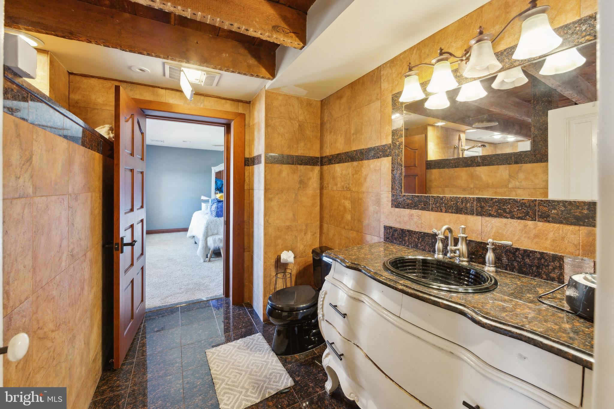 86 Sunset Road Royersford, PA 19468 - Photo 40 of 75 a kitchen with a sink and a refrigerator