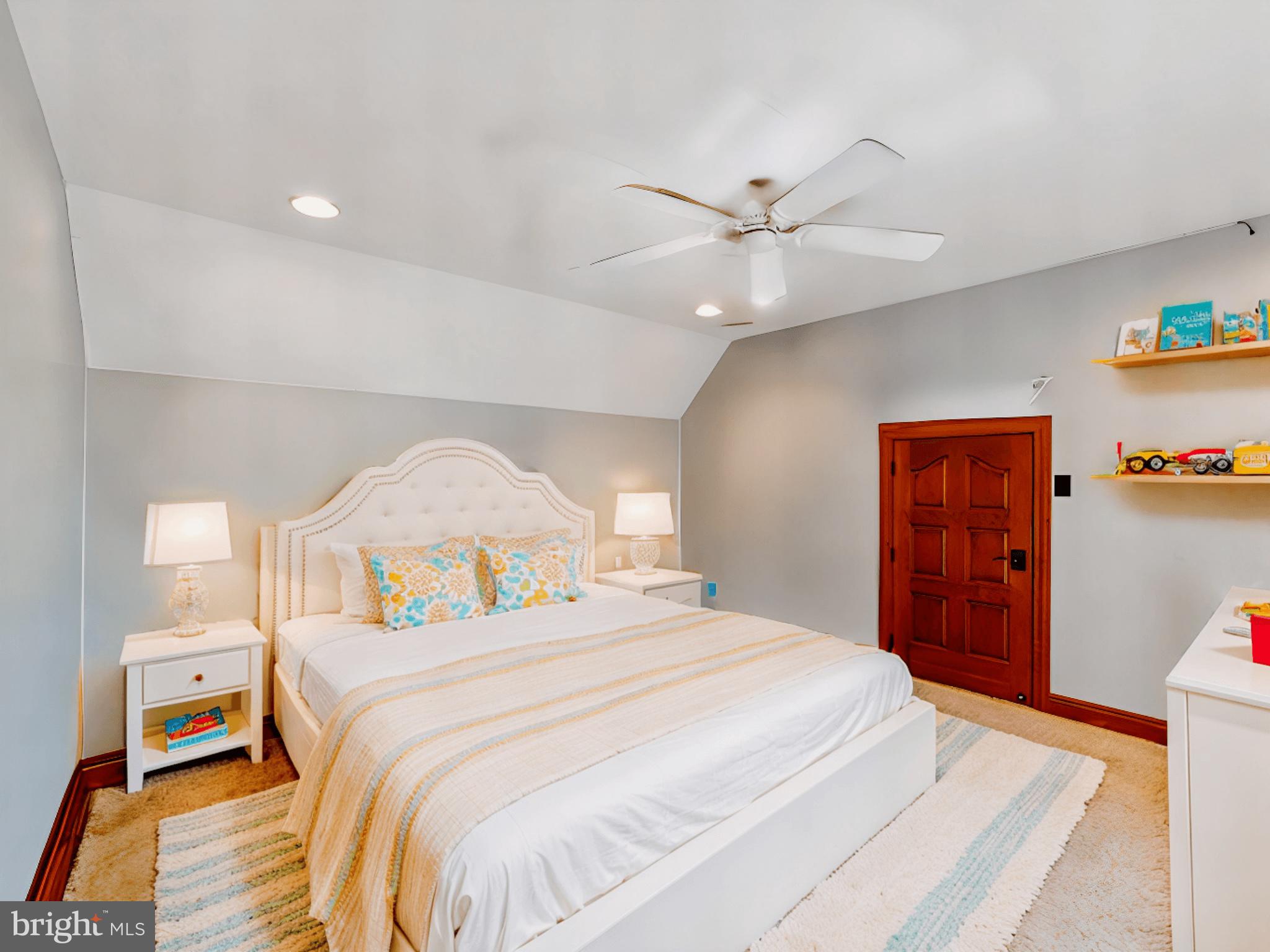 86 Sunset Road Royersford, PA 19468 - Photo 45 of 75 a bedroom with a bed and a chandelier