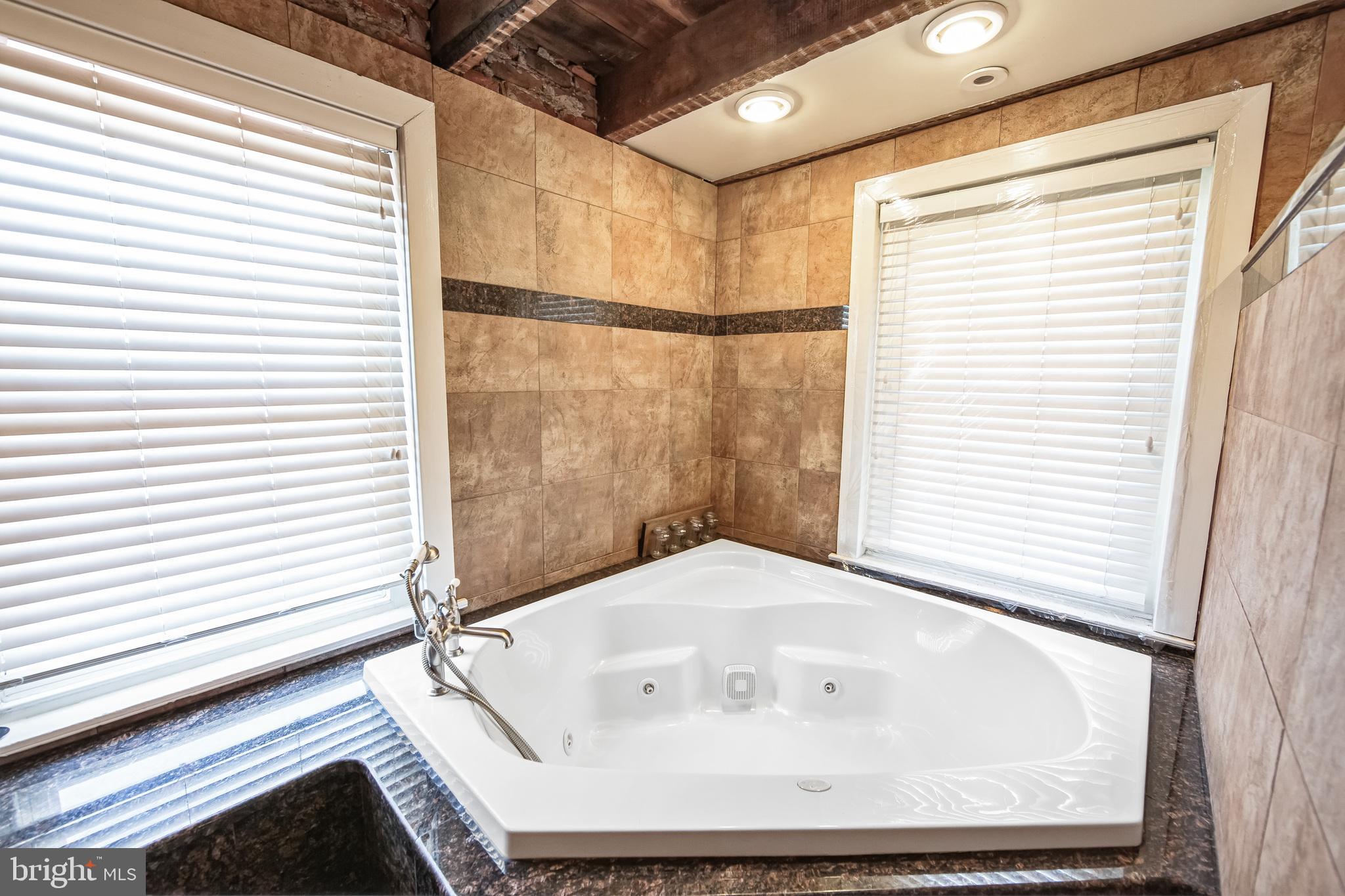 86 Sunset Road Royersford, PA 19468 - Photo 48 of 75 a bathroom with a bathtub and shower