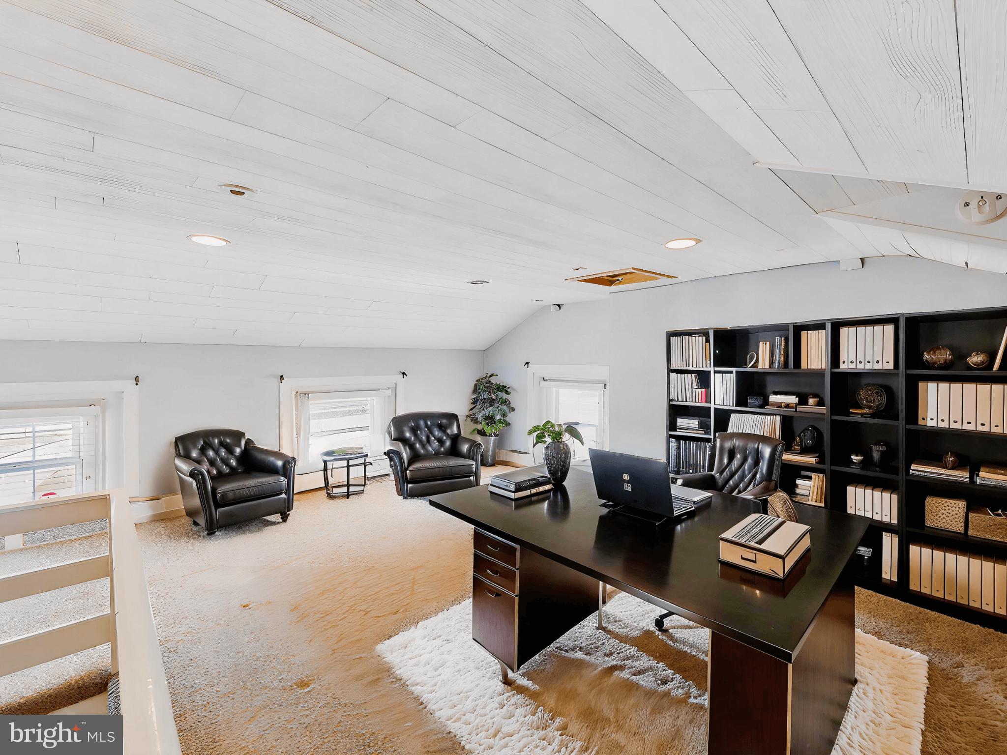 86 Sunset Road Royersford, PA 19468 - Photo 53 of 75 a living room with furniture and a book shelf
