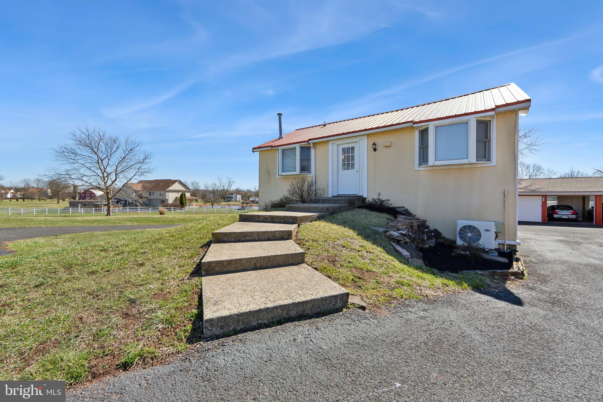 86 Sunset Road Royersford, PA 19468 - Photo 54 of 75 a front view of a house with garden
