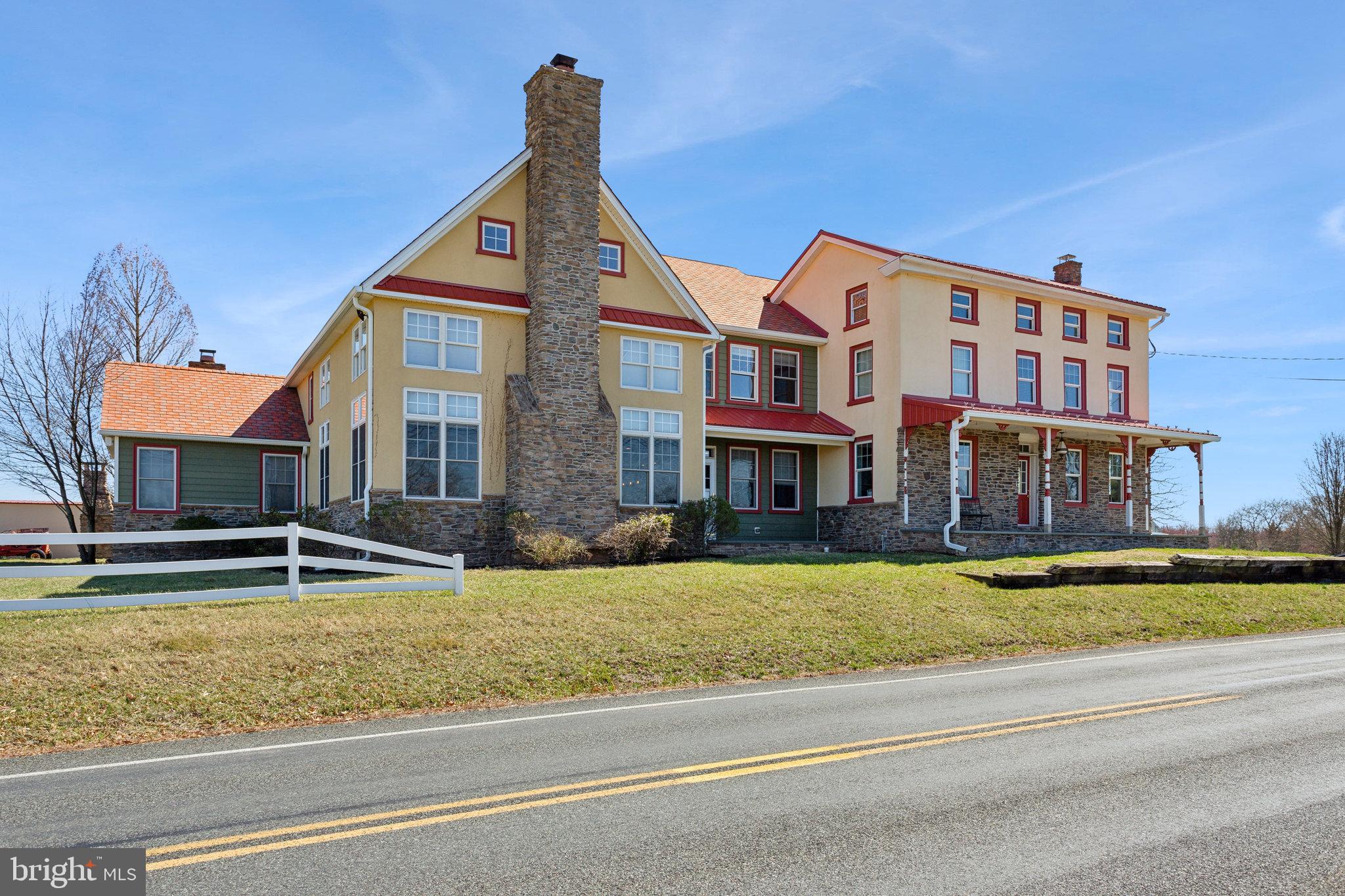 86 Sunset Road Royersford, PA 19468 - Photo 74 of 75 a front view of a house with a yard table and chairs