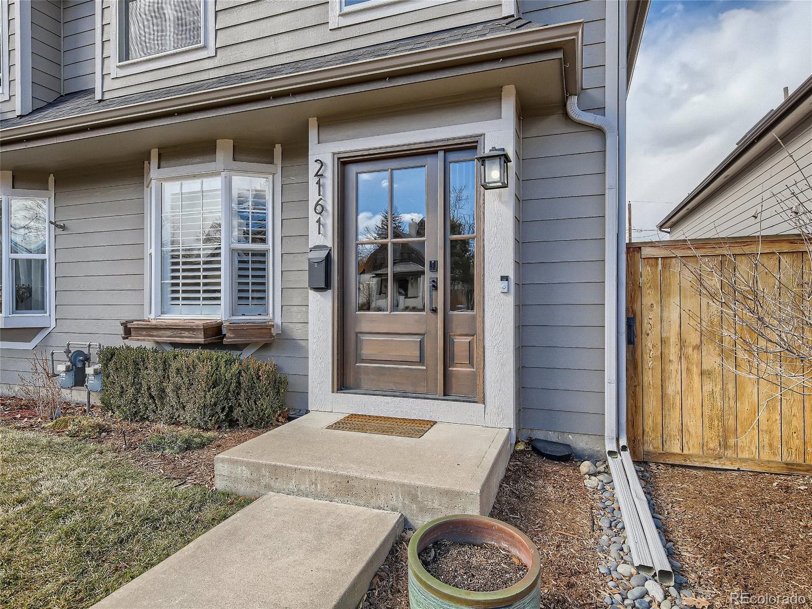 2161 South Grant Street Denver, CO 80210 - Photo 1 of 30 a front view of a house