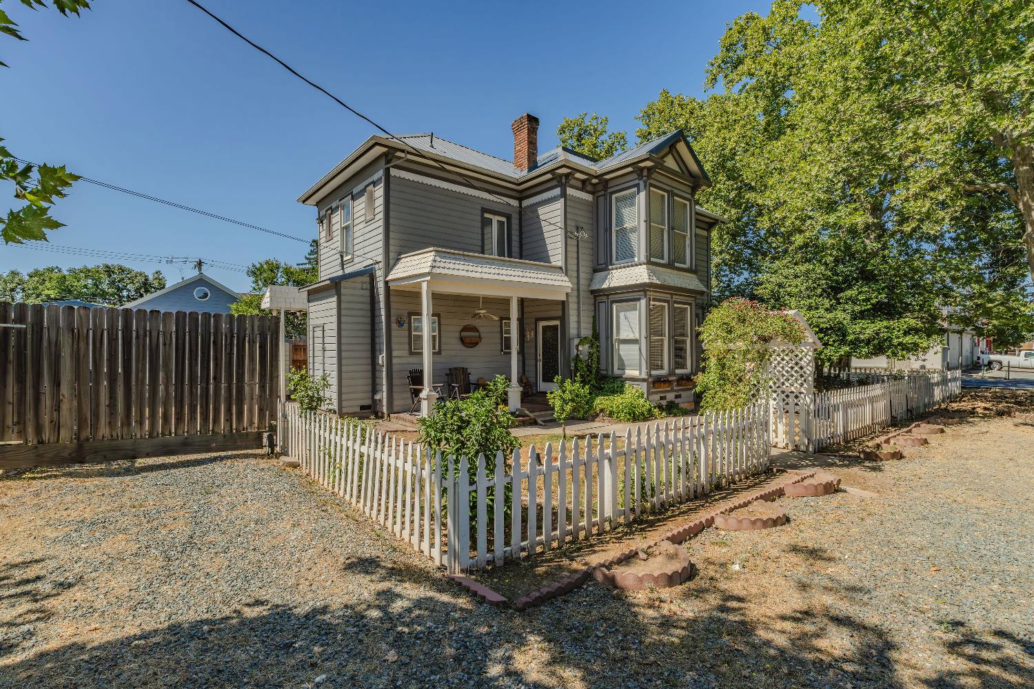 104 South Church Street Ione, CA 95640 - Photo 28 of 33 Side yard parking, gate opens to additional parking