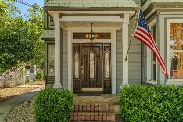 a front view of a house with a porch