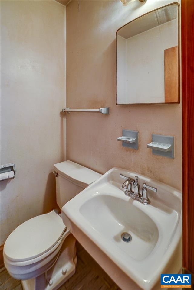 3384 Keswick Road Keswick, VA 22947 - Photo 29 of 49 a bathroom with a sink and a toilet