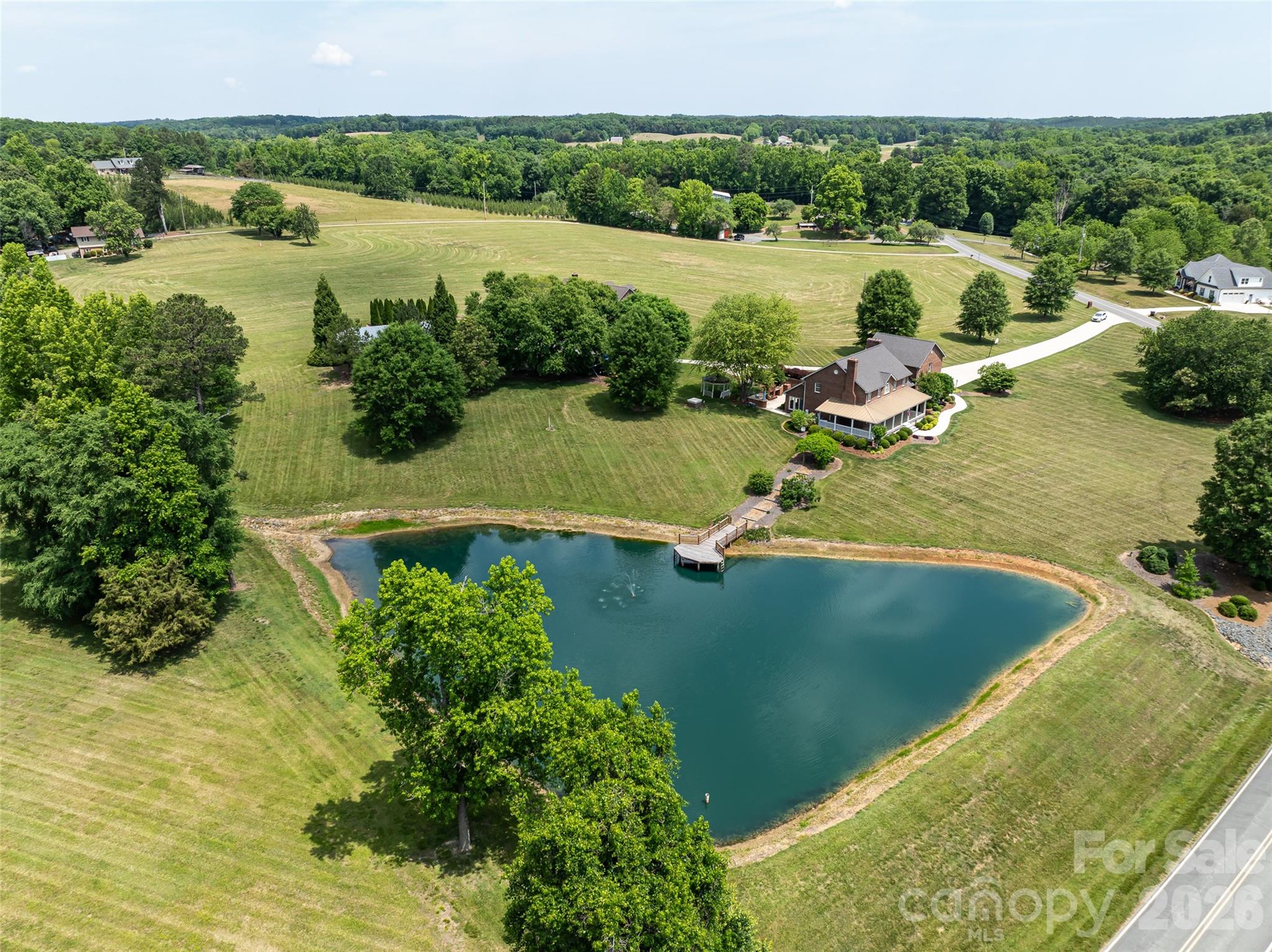 40659 Ridenhour Road Richfield, NC 28137 - Photo 5 of 25 a view of a lake with outdoor space