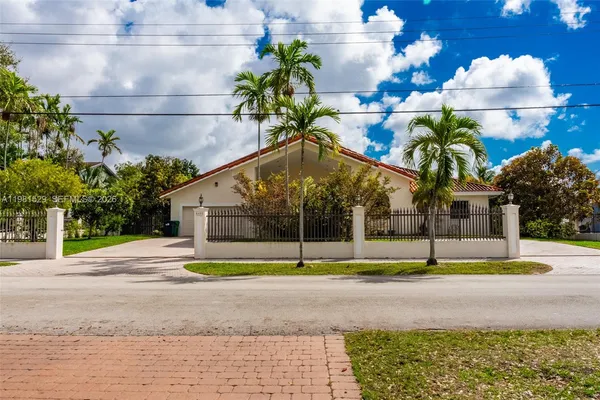 a view of street with houses