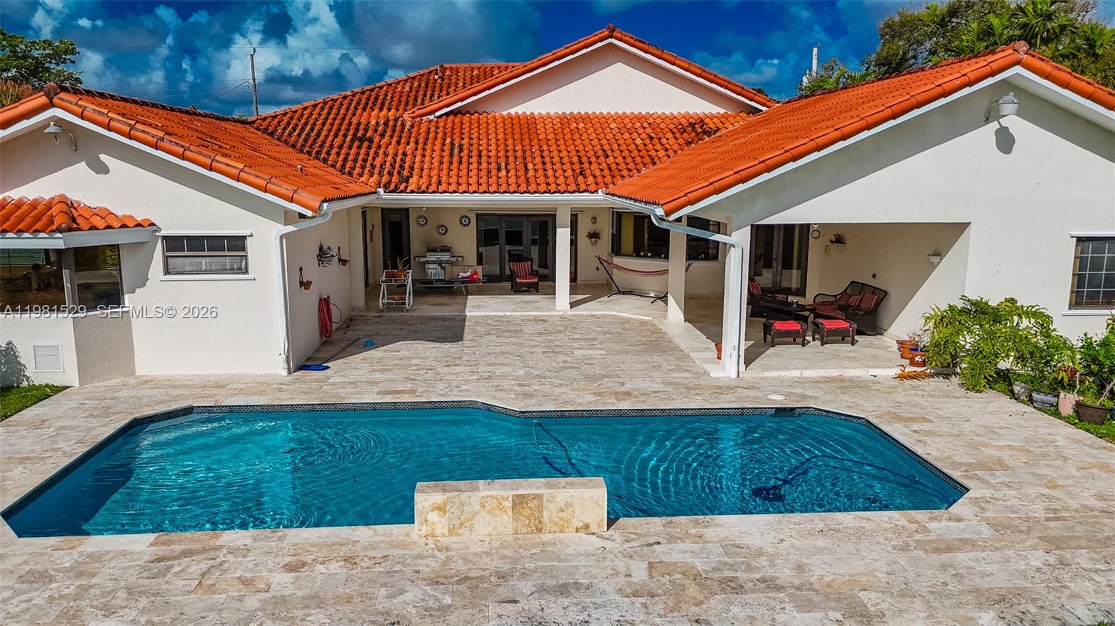 4655 Southwest 89th Avenue Miami, FL 33165 - Photo 25 of 38 a view of a house with backyard