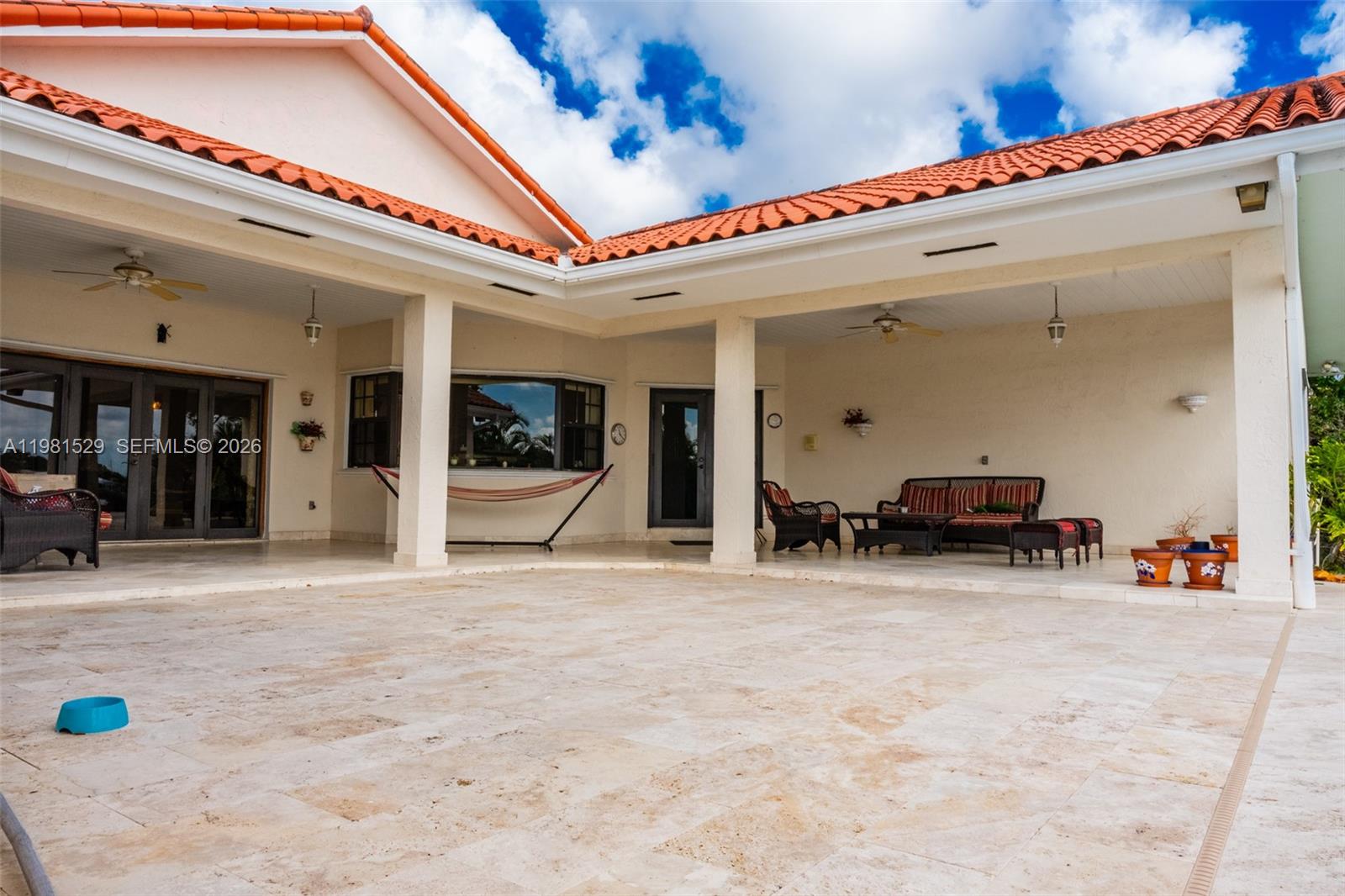 4655 Southwest 89th Avenue Miami, FL 33165 - Photo 28 of 38 a view of a building with sitting area