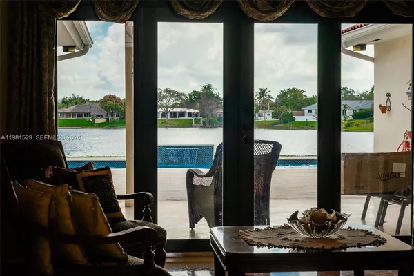 a view of a dining room with furniture window and outside view