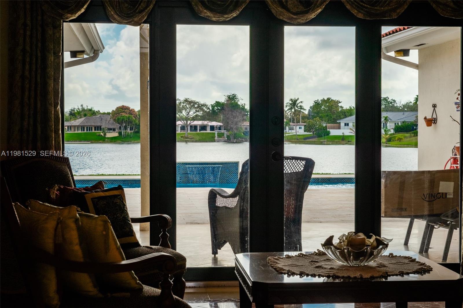 4655 Southwest 89th Avenue Miami, FL 33165 - Photo 4 of 38 a view of a dining room with furniture window and outside view