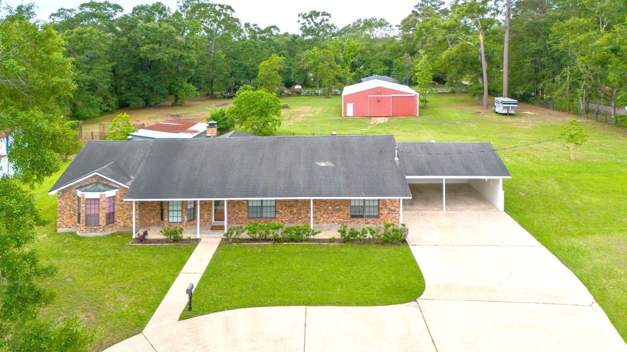 13180 Morgan Drive Splendora, TX 77372 - Photo 2 of 38 This is the place to have the best of both worlds that can include horses, livestock, gardening, and room for kiddos to play.