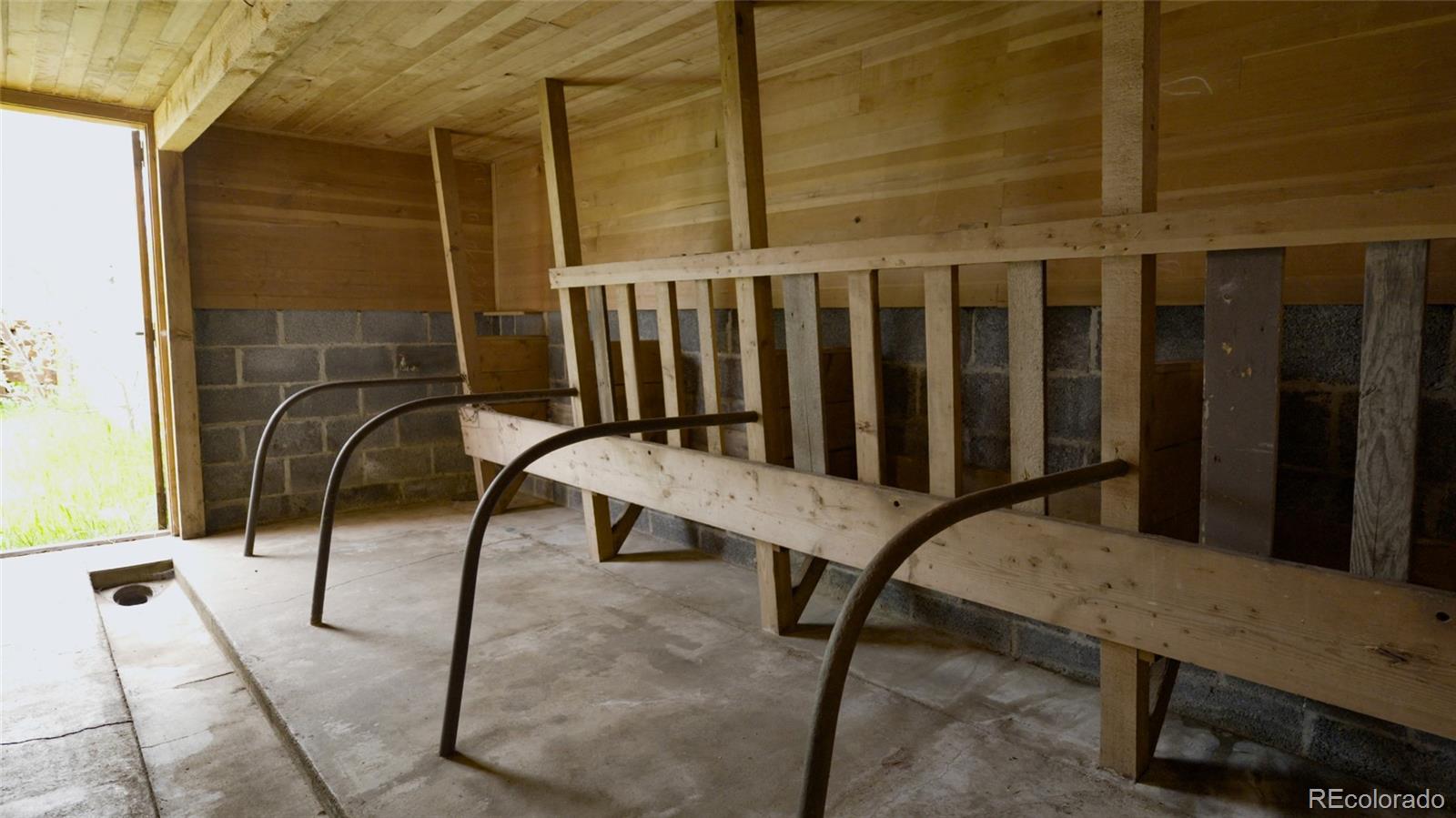 950 Corral Creek Road Evergreen, CO 80439 - Photo 15 of 50 a view of a balcony with chairs