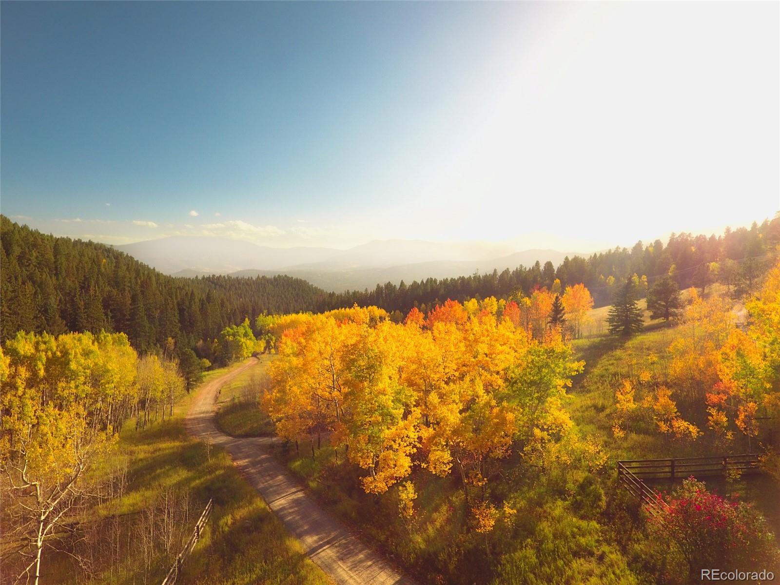 950 Corral Creek Road Evergreen, CO 80439 - Photo 44 of 50 a view of lake view and mountain