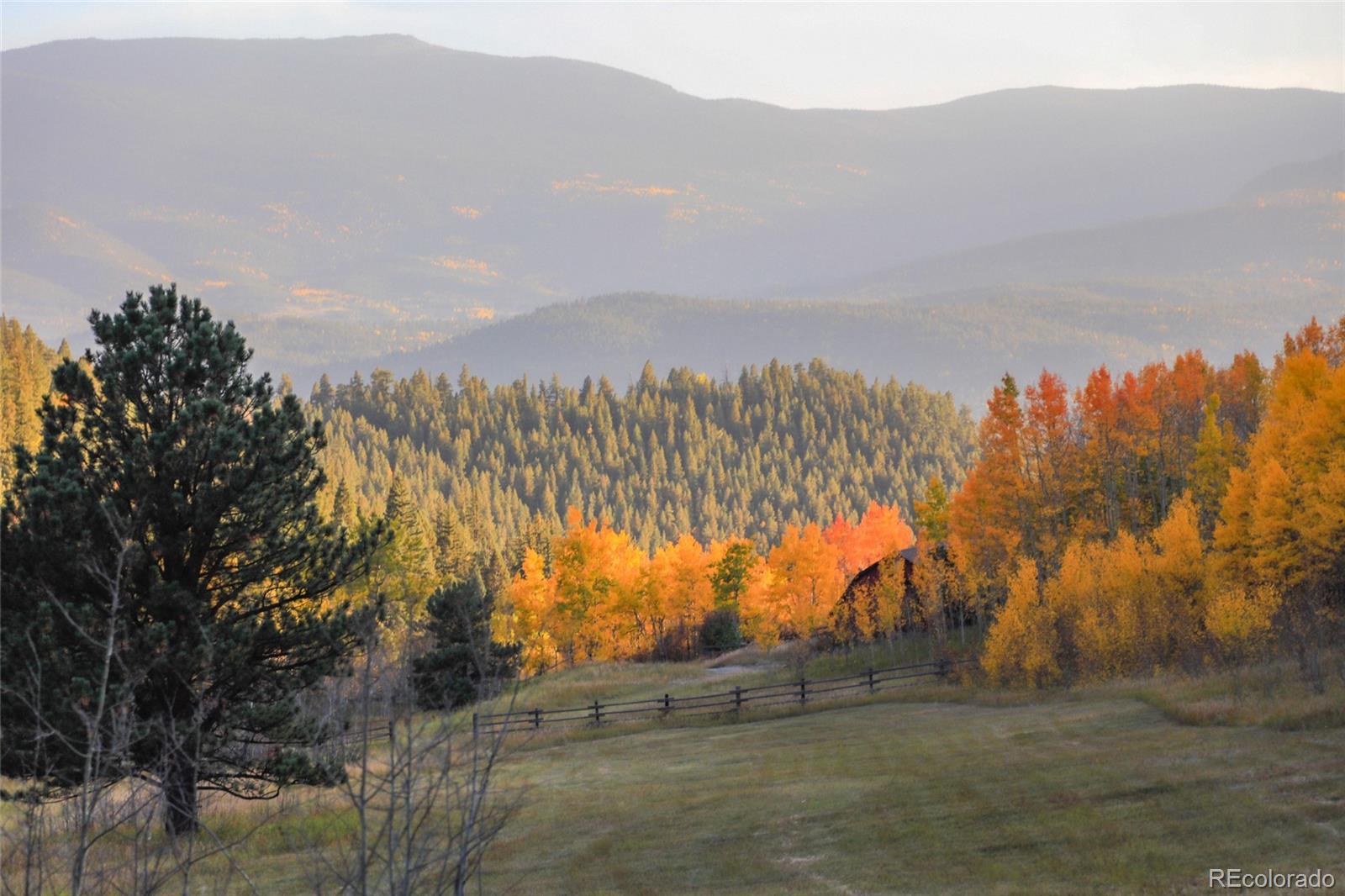 950 Corral Creek Road Evergreen, CO 80439 - Photo 47 of 50 a view of mountain view with mountains in the background